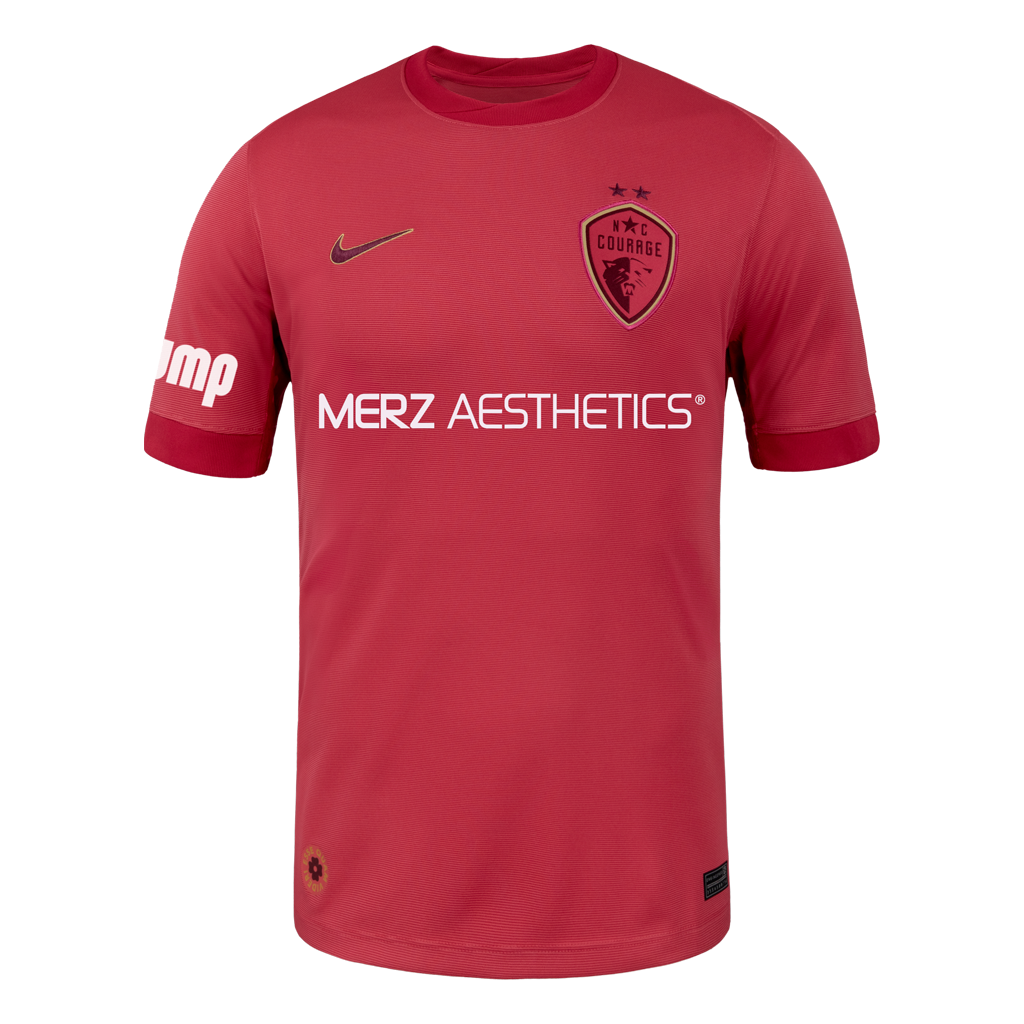 Pink sports jersey with Nike logo and 'Merz Aesthetics' branding on a white background