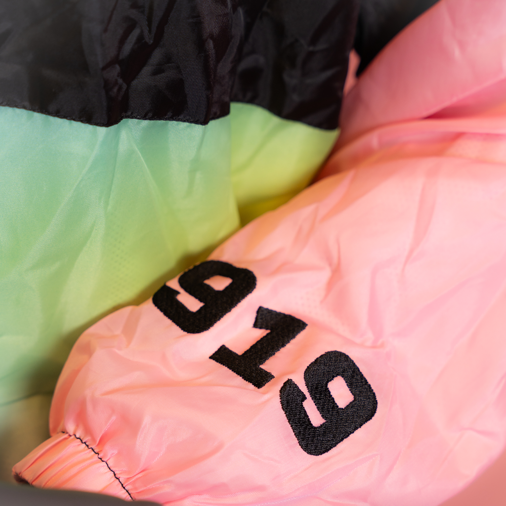 Colorful jacket with '919' printed on it
