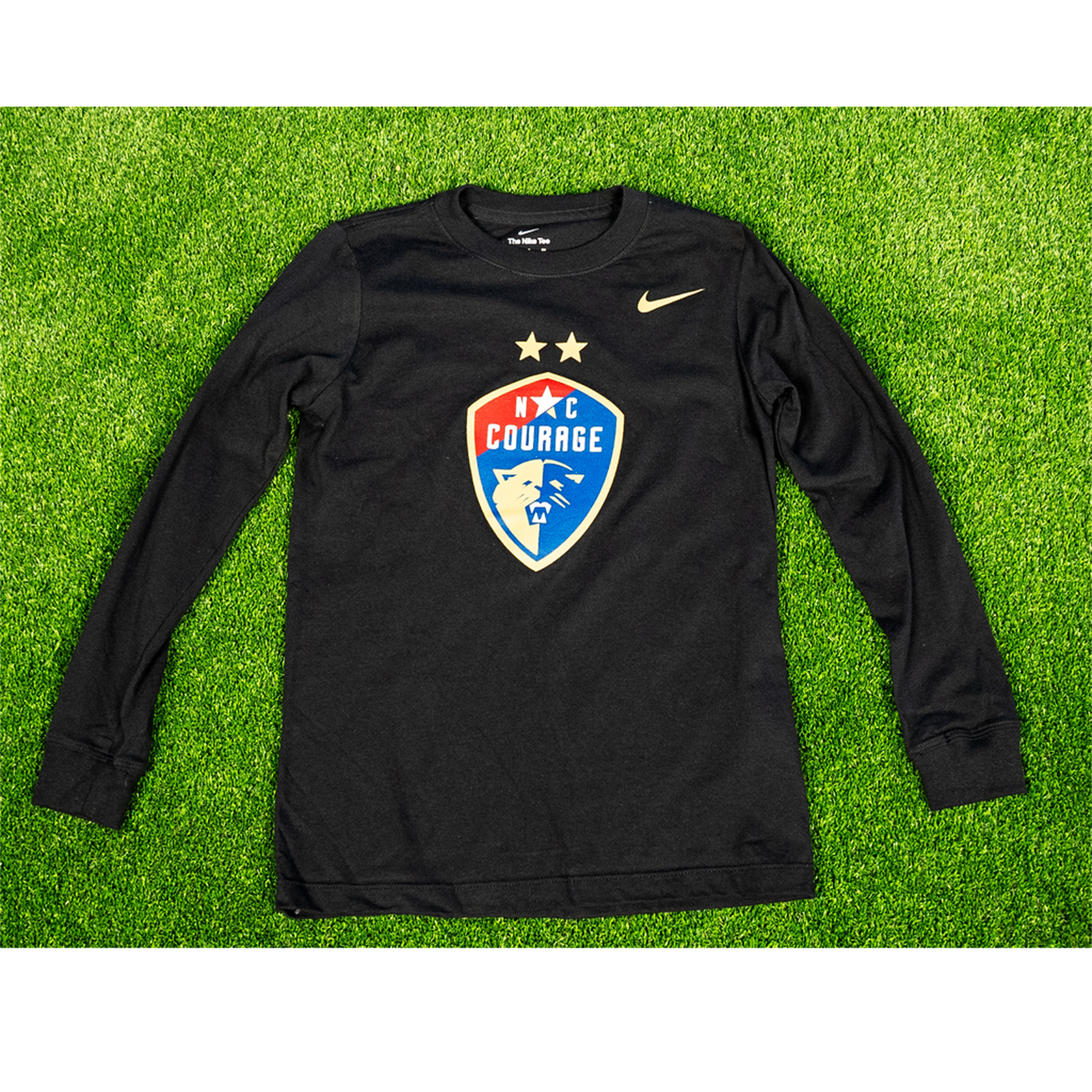 Youth black longsleeve tee with the NC Courage crest on the front.