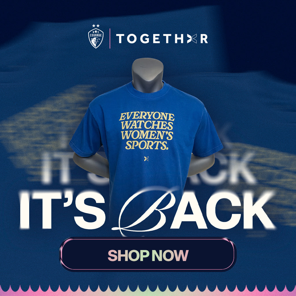 A promotional banner for TOGETHER apparel featuring a blue short-sleeve T-shirt. The shirt has yellow text reading 'EVERYONE WATCHES WOMEN'S SPORTS.