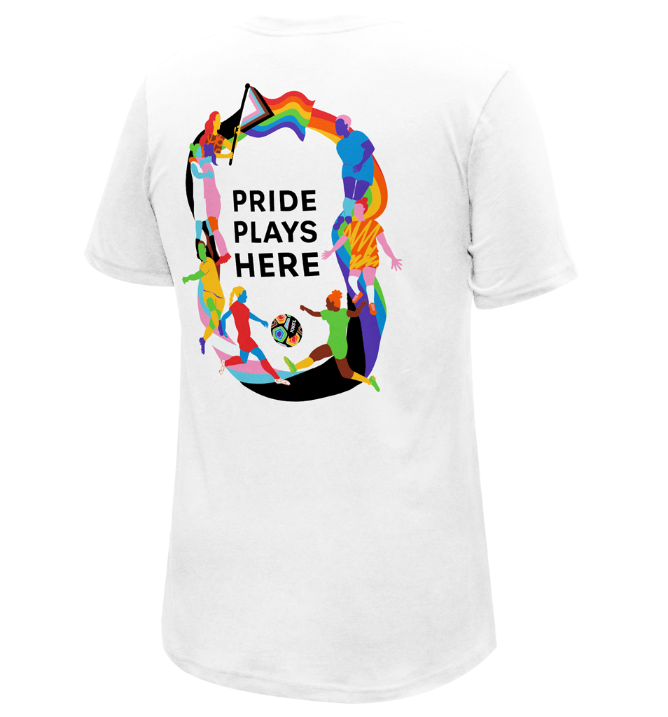 White t-shirt with 'Pride Plays Here' slogan and a colorful graphic design featuring human figures and geometric shapes.