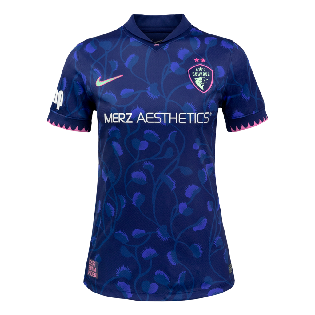 Blue sports jersey with venus flytrap patterns and branding on a white background