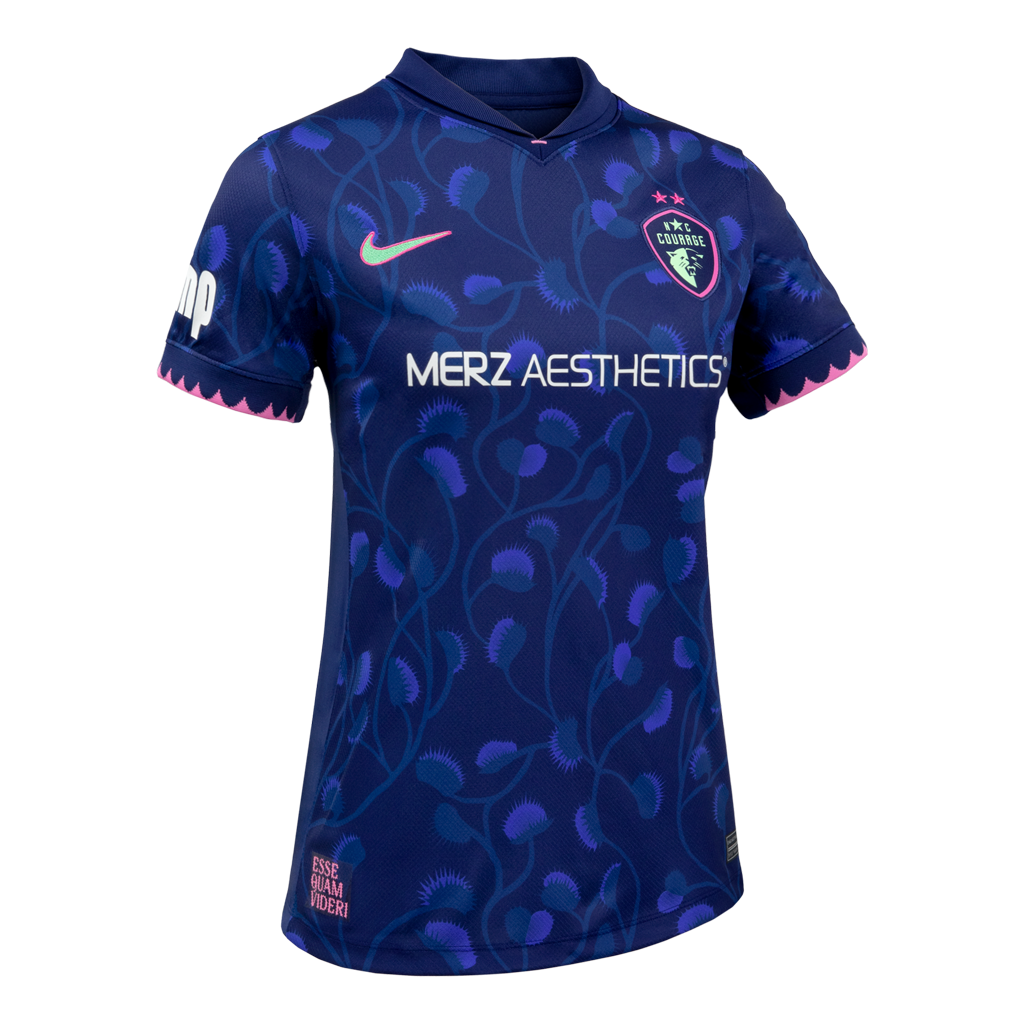 Blue sports jersey with venus flytrap patterns and branding on a white background