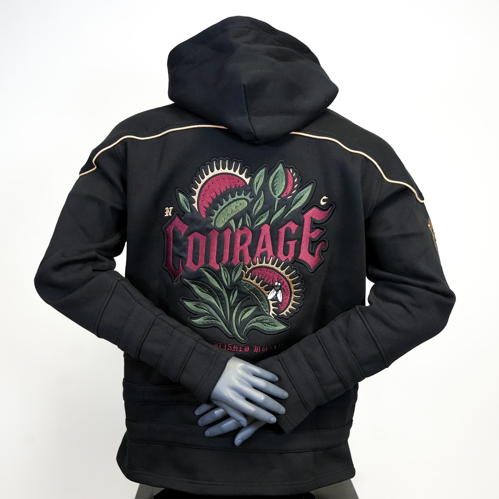 Black hoodie with 'Courage' design on the back against a white background