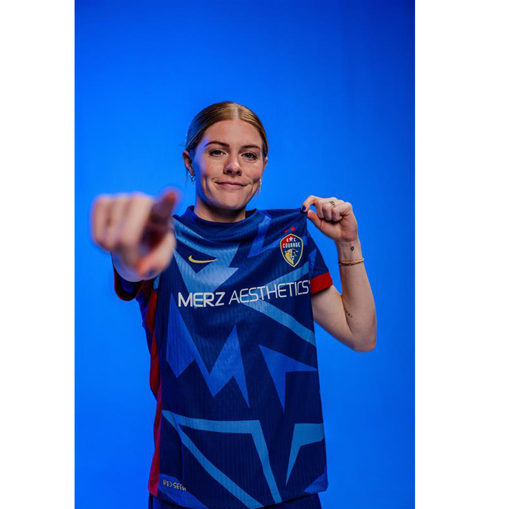 Cortnee Vine wearing the blue kit. 