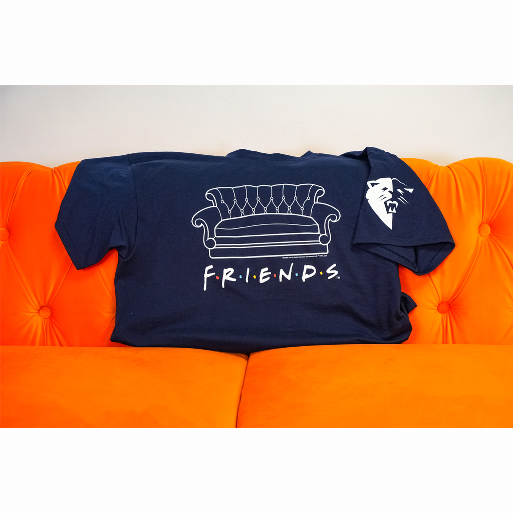 Blue T-Shirt with Friends logo and iconic Friends couch on the iconic orange Friends couch