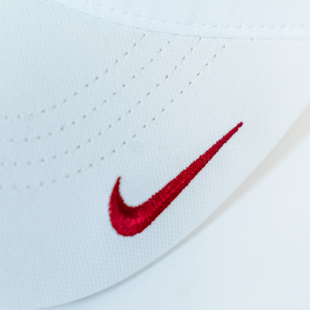 Closeup of Nike logo on the white visor